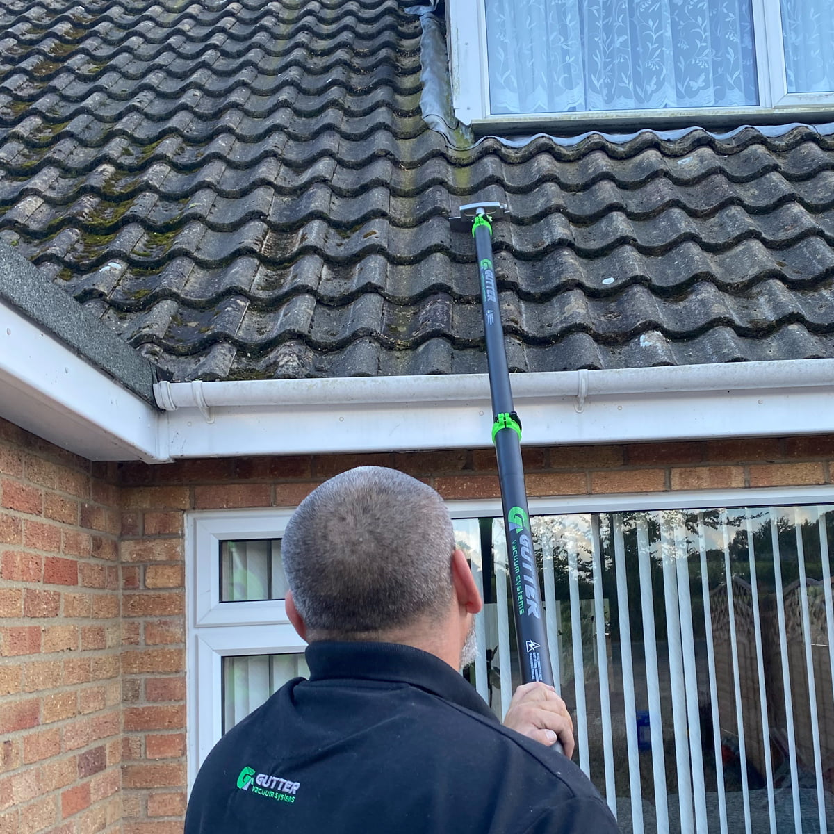 Roof Scraping and Soft Washing Gutter Vacuum Systems